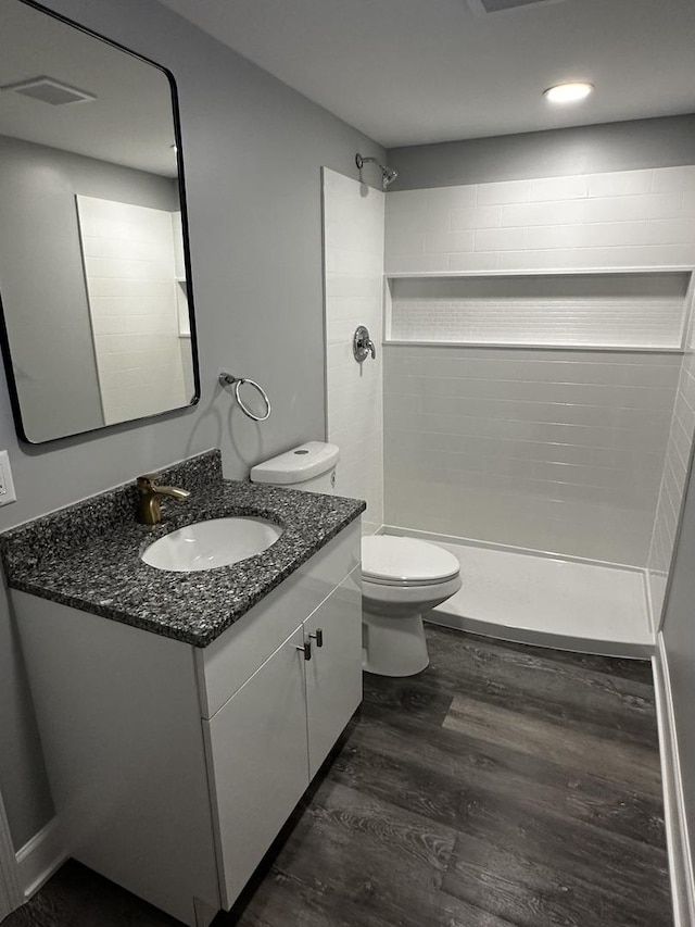 2212 N 2829th Rd, Marseilles, IL 61341 - full bath with vanity, a tile shower, and wood finished floors