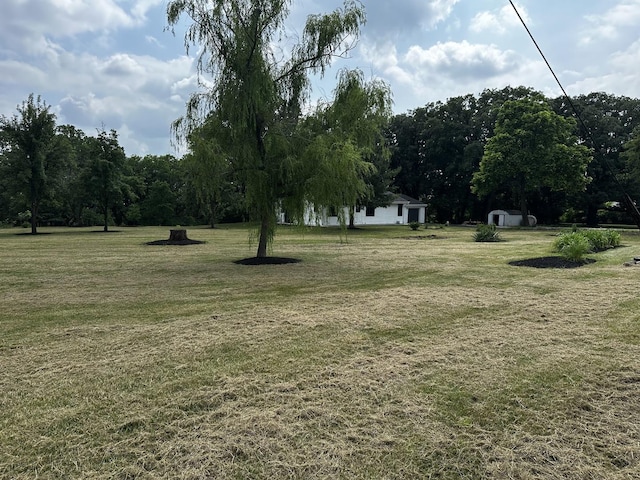 2212 N 2829th Rd, Marseilles, IL 61341 - view of green lawn featuring a shed