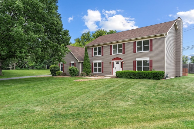 747 Jamestowne Ct, Sleepy Hollow, IL 60118 - colonial inspired home featuring a chimney and a front lawn