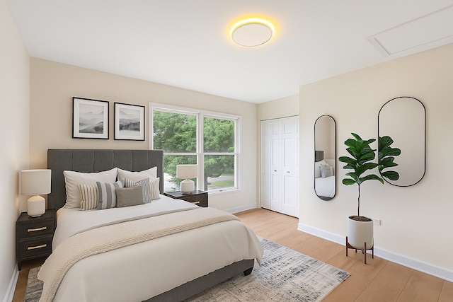 747 Jamestowne Ct, Sleepy Hollow, IL 60118 - bedroom with light wood finished floors, a closet, and attic access