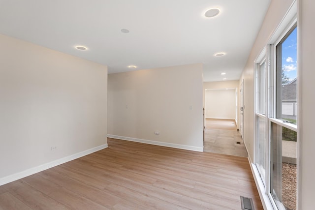 747 Jamestowne Ct, Sleepy Hollow, IL 60118 - empty room featuring light wood-type flooring and recessed lighting
