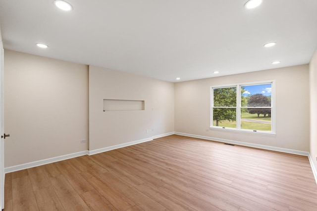 747 Jamestowne Ct, Sleepy Hollow, IL 60118 - unfurnished room with light wood-type flooring and recessed lighting