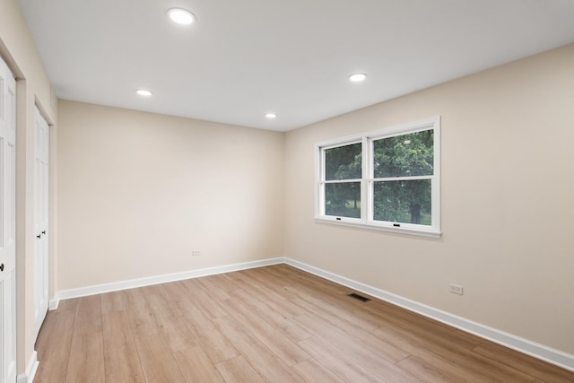 747 Jamestowne Ct, Sleepy Hollow, IL 60118 - unfurnished bedroom featuring light wood-style flooring and recessed lighting
