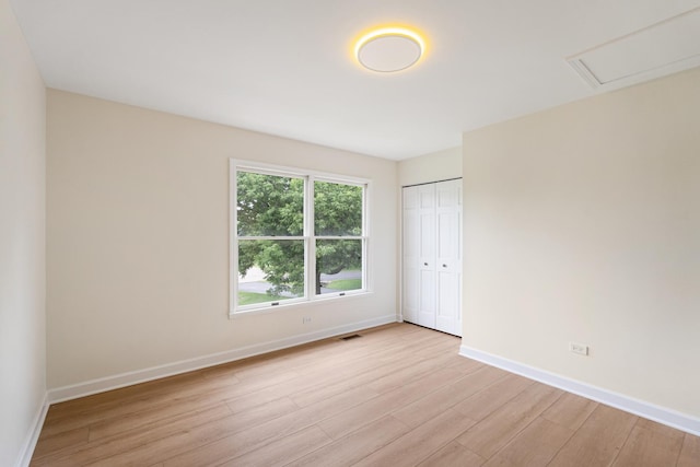747 Jamestowne Ct, Sleepy Hollow, IL 60118 - unfurnished room featuring light wood finished floors and baseboards