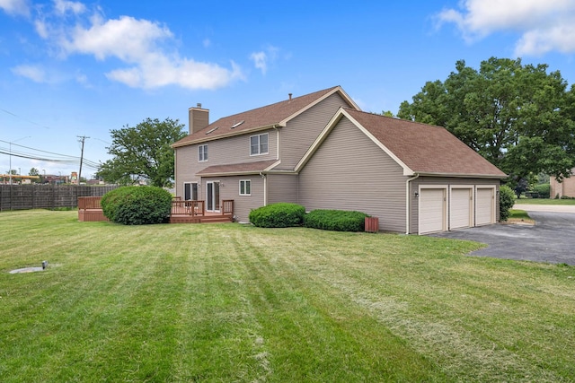 747 Jamestowne Ct, Sleepy Hollow, IL 60118 - back of house with a chimney, a wooden deck, a shingled roof, and driveway