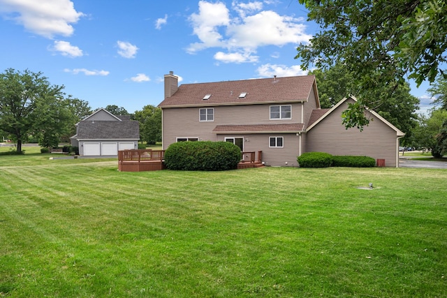 747 Jamestowne Ct, Sleepy Hollow, IL 60118 - rear view of house with a chimney, a detached garage, a lawn, and a wooden deck