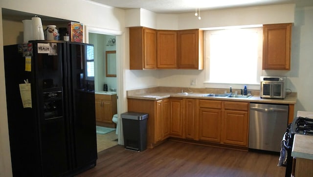 459 Talma St, Aurora, IL 60505 - kitchen featuring black appliances, dark wood finished floors, and plenty of natural light