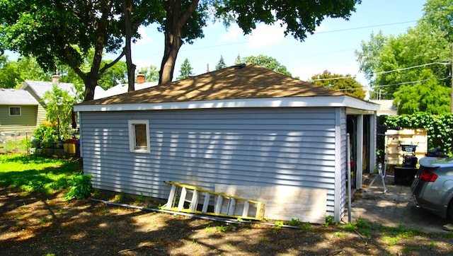 459 Talma St, Aurora, IL 60505 - view of property exterior with a chimney and an outdoor structure