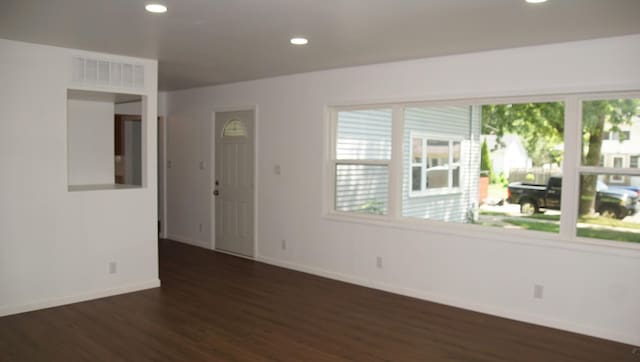 459 Talma St, Aurora, IL 60505 - spare room featuring wood finished floors and recessed lighting