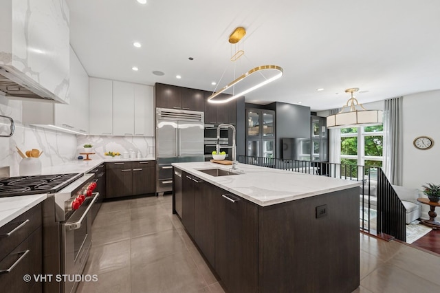 417 E N Water St, Chicago, IL 60611 - kitchen featuring high end appliances, custom exhaust hood, modern cabinets, dark brown cabinets, and recessed lighting