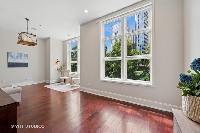 417 E N Water St, Chicago, IL 60611 - unfurnished living room with dark wood-style floors and recessed lighting