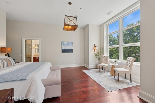 417 E N Water St, Chicago, IL 60611 - bedroom with dark wood-style floors and connected bathroom