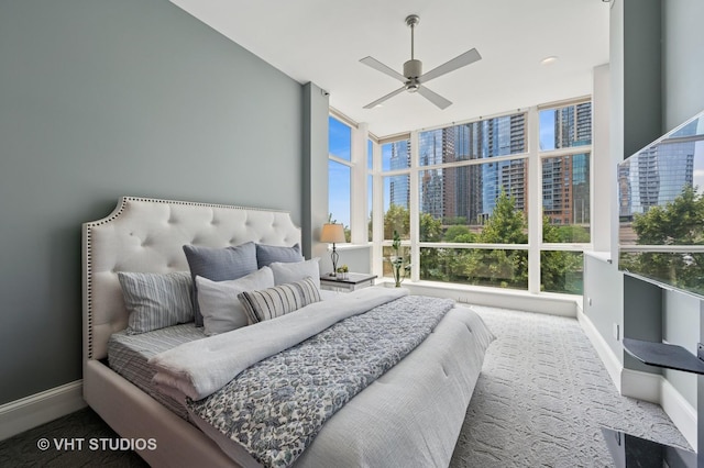 417 E N Water St, Chicago, IL 60611 - carpeted bedroom featuring expansive windows, multiple windows, and a ceiling fan