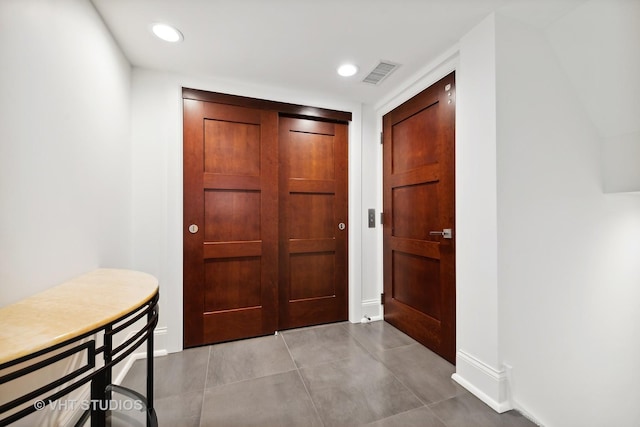 417 E N Water St, Chicago, IL 60611 - entryway featuring recessed lighting and light tile patterned floors