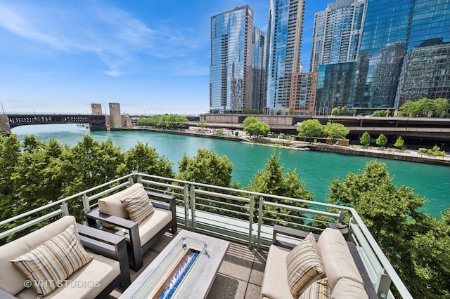 417 E N Water St, Chicago, IL 60611 - balcony featuring a water view, outdoor lounge area, and a view of city