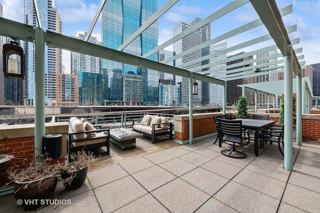 417 E N Water St, Chicago, IL 60611 - view of patio featuring an outdoor hangout area, a pergola, outdoor dining area, and a view of city