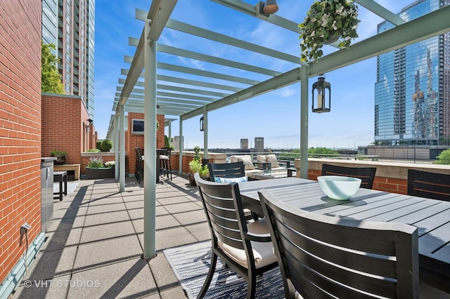 417 E N Water St, Chicago, IL 60611 - view of patio with a pergola and outdoor dining area