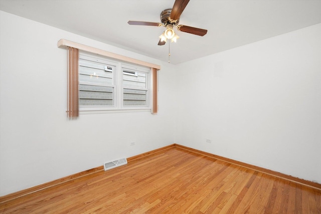 2317 W 50th St, Chicago, IL 60609 - empty room featuring ceiling fan and light wood-type flooring