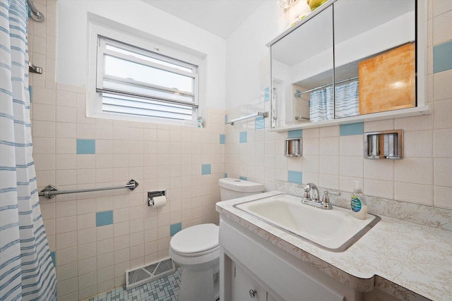 2317 W 50th St, Chicago, IL 60609 - bathroom featuring tile walls, a shower with curtain, vanity, and tile patterned flooring