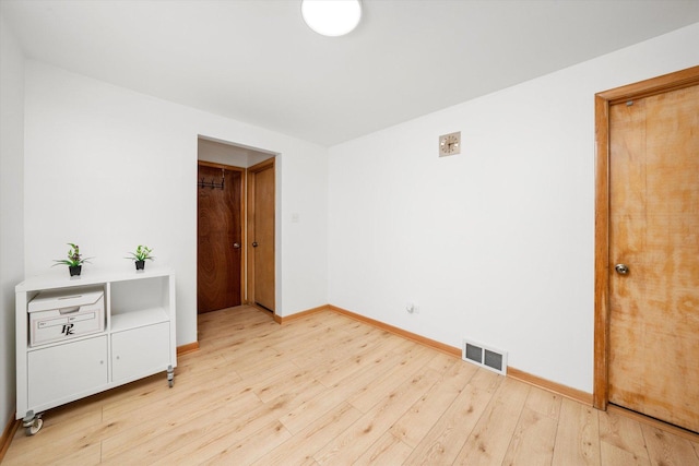2317 W 50th St, Chicago, IL 60609 - empty room featuring light wood-type flooring