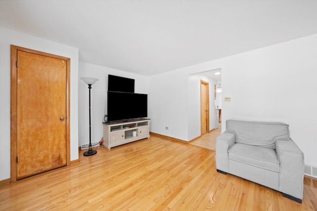 2317 W 50th St, Chicago, IL 60609 - living area featuring light wood finished floors and baseboards