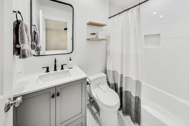 2743 N Wayne Ave Unit B, Chicago, IL 60614 - bathroom featuring vanity, shower / bathtub combination with curtain, and tile patterned floors