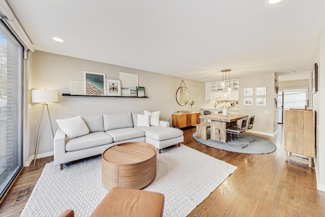 2743 N Wayne Ave Unit B, Chicago, IL 60614 - living area with wood finished floors, a chandelier, and recessed lighting