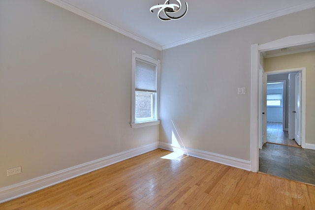 7851 W Cressett Dr, Elmwood Park, IL 60707 - unfurnished room featuring a chandelier, ornamental molding, and light wood-style floors