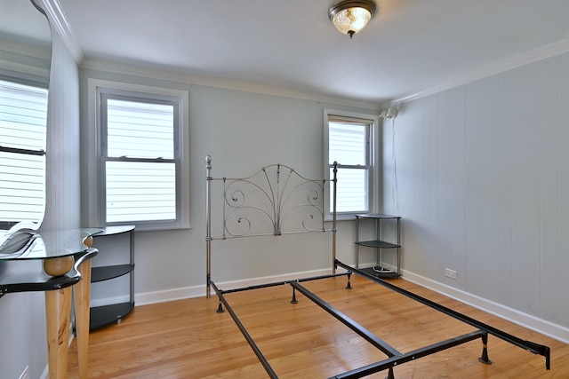 7851 W Cressett Dr, Elmwood Park, IL 60707 - bedroom featuring light wood-type flooring and crown molding