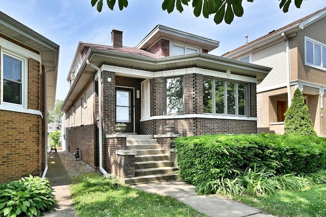 7851 W Cressett Dr, Elmwood Park, IL 60707 - view of front of property with a chimney and brick siding