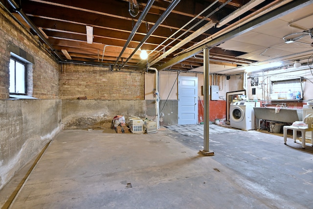 7851 W Cressett Dr, Elmwood Park, IL 60707 - basement featuring washer / dryer and a workshop area