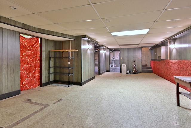 7851 W Cressett Dr, Elmwood Park, IL 60707 - finished below grade area with a drop ceiling, wood walls, and stairway