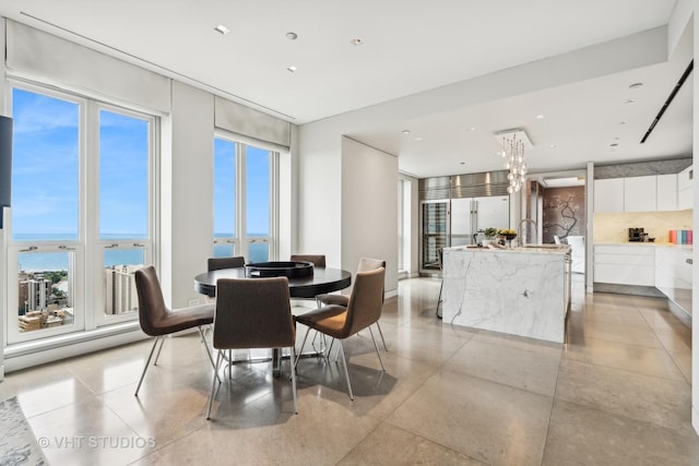 11 E Walton St Unit 4902, Chicago, IL 60611 - dining space with a water view and healthy amount of natural light