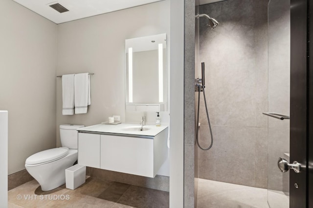 11 E Walton St Unit 4902, Chicago, IL 60611 - bathroom featuring tiled shower, vanity, and tile patterned floors