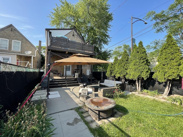 3401 W Beach Ave, Chicago, IL 60651 - rear view of property featuring an outdoor fire pit, a patio, and a wooden deck