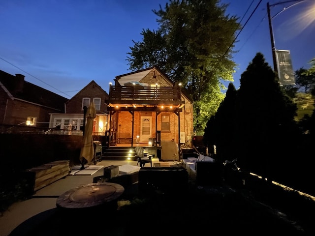3401 W Beach Ave, Chicago, IL 60651 - rear view of house with a balcony