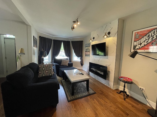 3401 W Beach Ave, Chicago, IL 60651 - living room with a tiled fireplace and wood finished floors