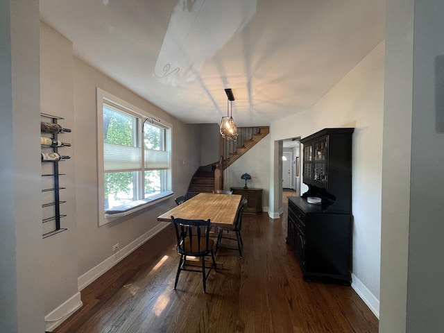 3401 W Beach Ave, Chicago, IL 60651 - dining space with stairway and dark wood-style flooring