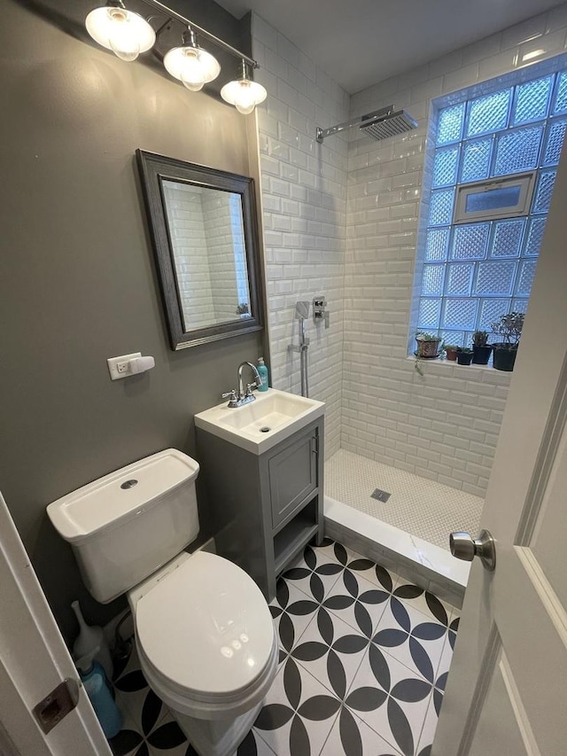 3401 W Beach Ave, Chicago, IL 60651 - bathroom with a tile shower and vanity