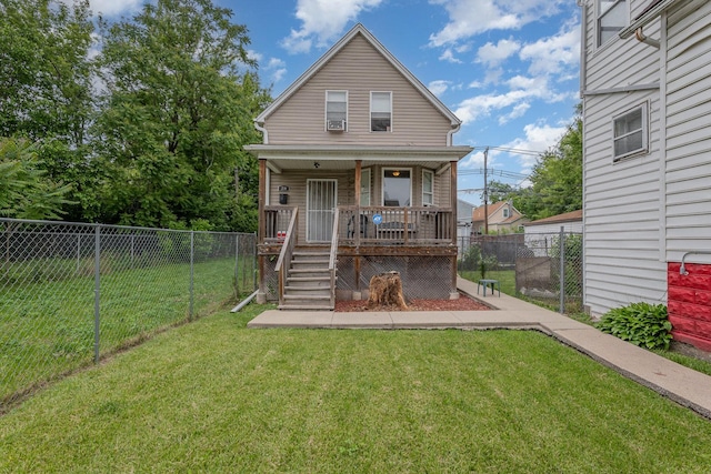 28 W 112th St, Chicago, IL 60628 - view of front facade featuring covered porch and a fenced backyard
