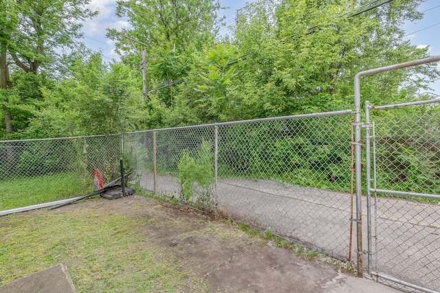 28 W 112th St, Chicago, IL 60628 - view of yard with a gate