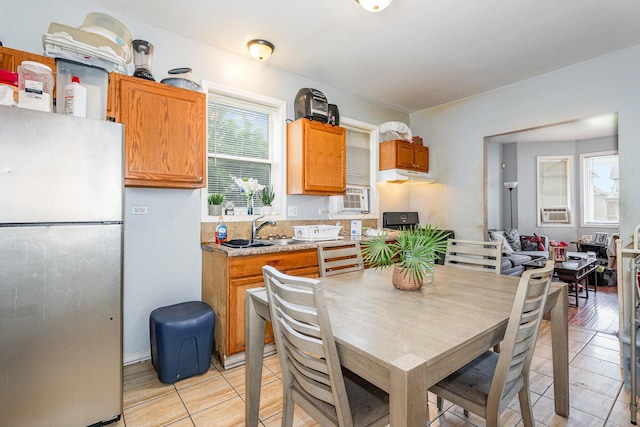 28 W 112th St, Chicago, IL 60628 - dining room featuring light tile patterned floors