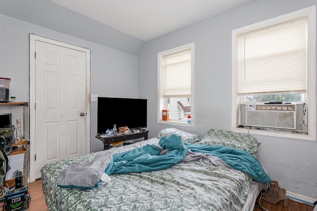 28 W 112th St, Chicago, IL 60628 - bedroom with wood finished floors, lofted ceiling, and cooling unit