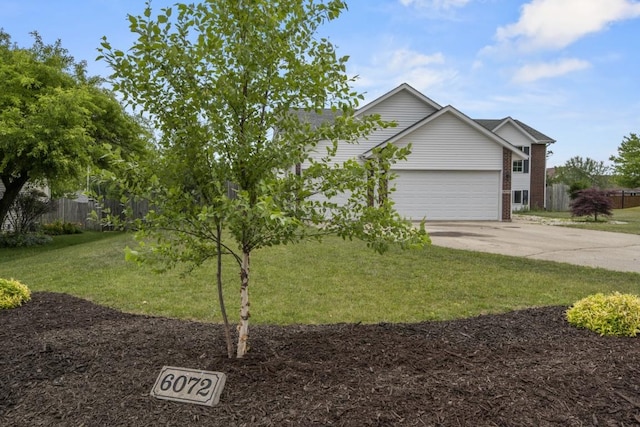 6072 Nimtz Ct, Loves Park, IL 61111 - view of front of property featuring brick siding, concrete driveway, and a garage
