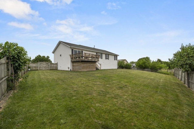 6072 Nimtz Ct, Loves Park, IL 61111 - fenced backyard with a wooden deck and stairway