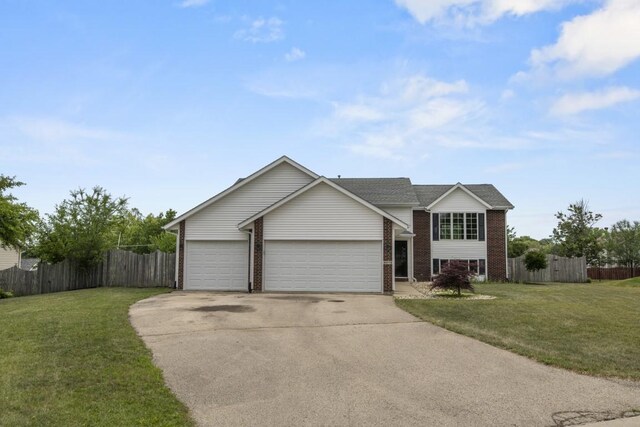 6072 Nimtz Ct, Loves Park, IL 61111 - view of front of home with driveway, brick siding, and an attached garage