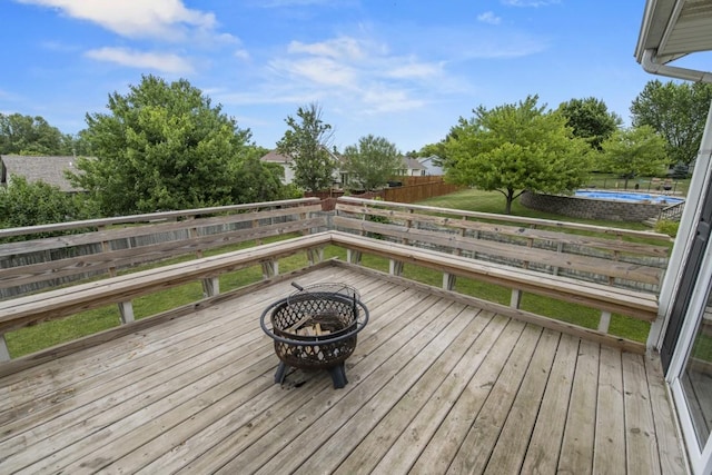 6072 Nimtz Ct, Loves Park, IL 61111 - wooden terrace with a fire pit, a fenced backyard, and a pool