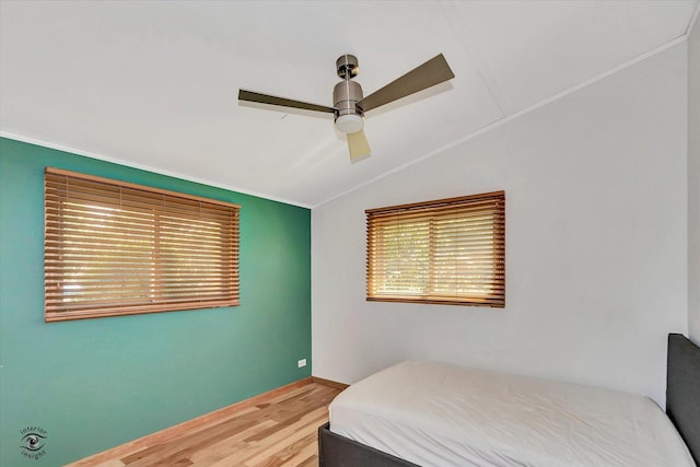 944 E County Line Rd, Beecher, IL 60401 - bedroom featuring vaulted ceiling, wood finished floors, and ceiling fan