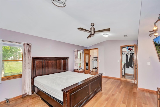 944 E County Line Rd, Beecher, IL 60401 - bedroom featuring vaulted ceiling, light wood-style flooring, and ceiling fan