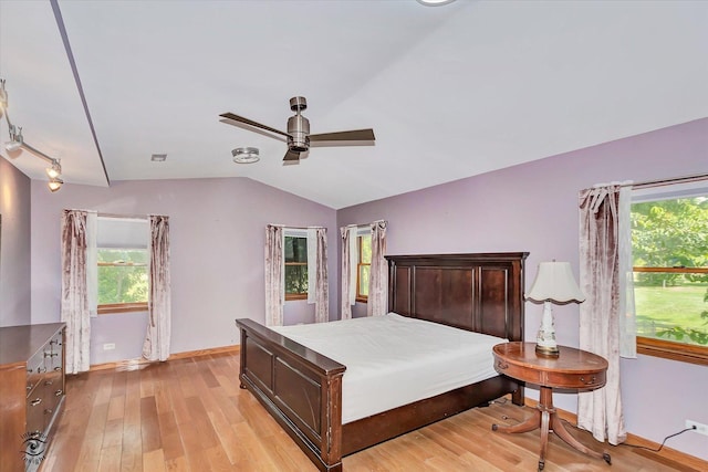 944 E County Line Rd, Beecher, IL 60401 - bedroom featuring lofted ceiling, light wood-type flooring, and a ceiling fan